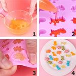 Načítať obrázok do zobrazovača galérie, Silikónová forma na gumených dinosauríkov s pipetou  - zelená
